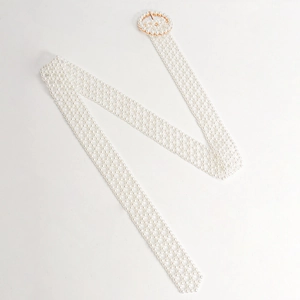 Elegant white pearl woven belt with a round pearl-embellished metal buckle for dresses