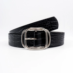 Close-up of black faux crocodile leather belt with silver double-frame pin buckle