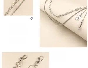 Detail of layered punk hip-hop waist chain with MIND metal tag and lobster clasp closure