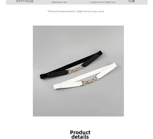 Dettaglio delle cinture elastiche da 65 cm in bianco e nero con fibbie metalliche oro