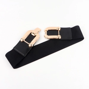 Detail of black elastic wide belt with golden U-shaped buckle for dress styling