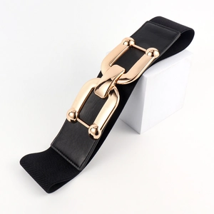 Close-up of wide elastic belt featuring a large gold interlocking chain buckle