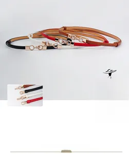 Detail of slim fashion belts for women in four colors with gold metal buckles