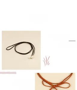 Detail of woven rope belt with elegant pearl charms in black and brown styles