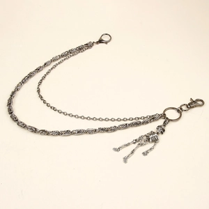 Détails de la chaîne de pantalon double en métal punk avec pendentifs tête de mort