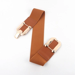 Detail of wide brown elastic belt with golden horsebit metal buckles and fabric texture