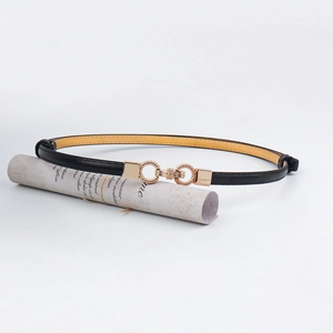 Elegant thin black leather belt for women featuring a stylish gold interlocking ring buckle