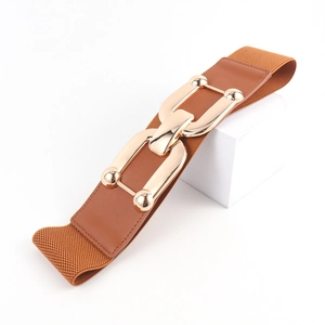 Detail of caramel brown elastic wide waist belt with decorative interlocking gold metal buckle