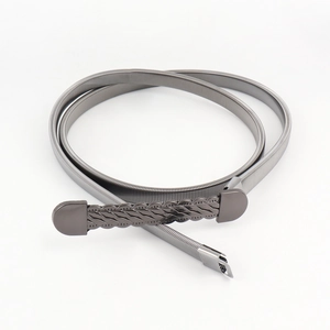 Women's minimalist gunmetal elastic spring belt with a woven metal buckle design