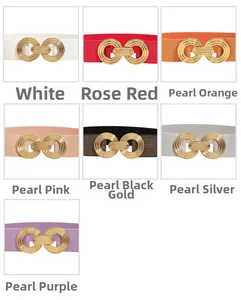 Detail view of elastic waist belts in seven vibrant colors with golden metal buckles
