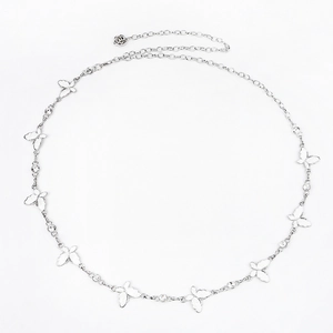 Detail of silver butterfly waist chain with sparkling rhinestones and rose pendant
