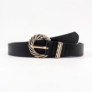 Women's black leather belt featuring a unique gold twisted round buckle for jeans