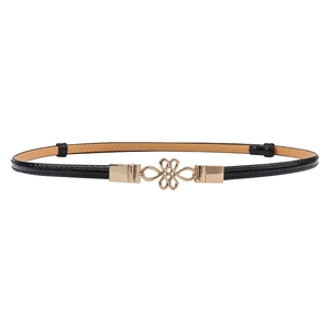 Elegant thin black belt with a gold ruyi knot buckle for women dresses and fashion accessories