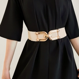Women's beige wide elastic belt with a golden interlocking metal buckle for dresses