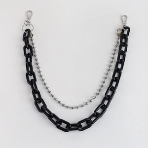 Close-up of dual-layer black acrylic chain and silver metal bead chain with lobster clasps