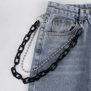 Detail of double-layered punk waist chain with black acrylic and silver beaded links