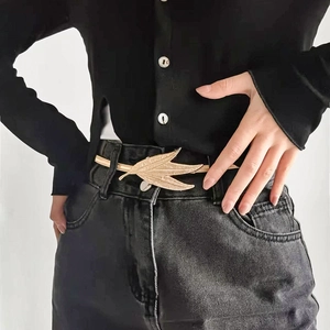 Women's gold elastic metal waist chain featuring three detailed leaves as a stylish buckle