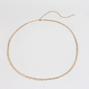 Detailed view of double-layer gold heart body chain with adjustable lobster clasp