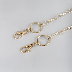 Polished gold snake chain pants accessory with dual swivel lobster clasps for women