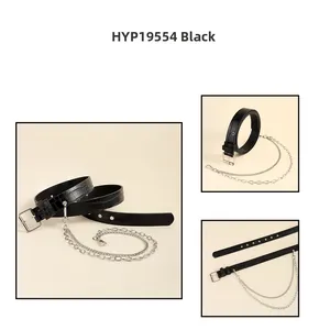 Detail view of black punk belt featuring crocodile pattern and silver double chains