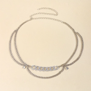 Detail of silver multi-layer chain waist belt with small lock charms and lobster clasp