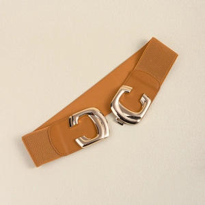 Detail of camel elastic waist belt with gold interlocking C-shaped metal buckle