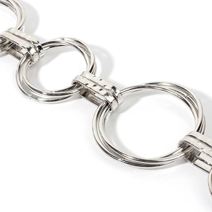 Detailed view of shiny silver metal body chain for women stylish waist jewelry accessory