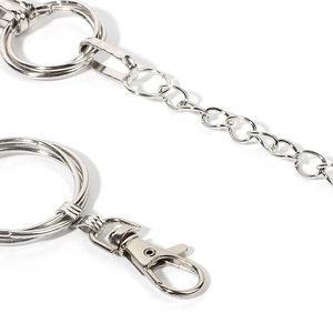Detailed close-up of a high-polish silver metal chain with lobster clasp and round rings