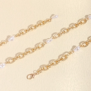 Fashionable gold link chain body jewelry with white baroque pearls and lobster clasp