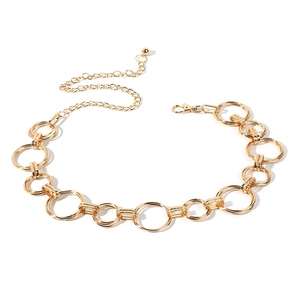 Polished gold metal waist chain with alternating round ring links and lobster clasp closure