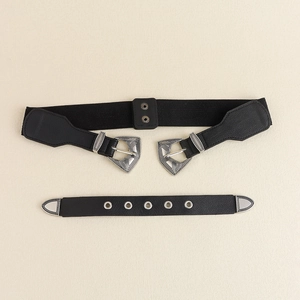 Détail de la ceinture élastique vintage avec gravures florales argentées complexes