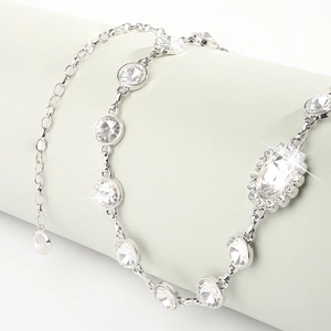 Elegant silver rhinestone waist chain accessory for dresses with sparkling crystal gems