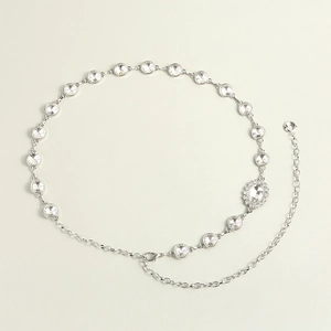 Elegant silver rhinestone waist chain belt with an oval centerpiece for dresses and suits