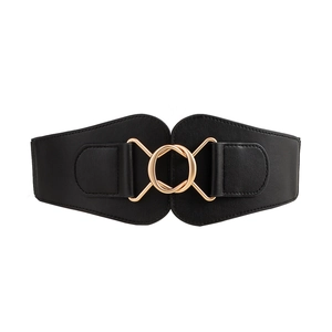 Women's wide elastic black waist belt featuring a decorative round gold metal buckle