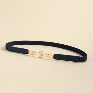 Detailed view of women's thin elastic belt with gold infinity knot metal buckle