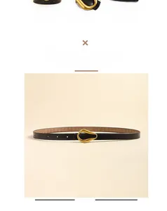 Détail d'une ceinture en cuir noir avec une boucle dorée en forme de goutte et des trous de réglage