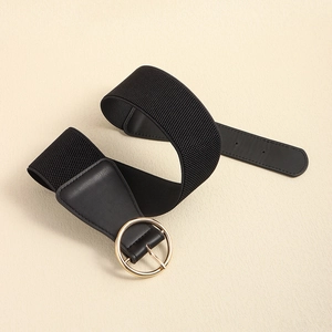 Detail of black elastic cinch belt with gold round alloy buckle for coats and shirts