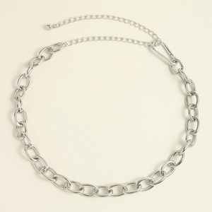 Close-up of chunky silver metal chain belt with lobster clasp and adjustable extension link