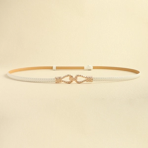 Detail view of cream thin leather belt featuring a golden twisted rope buckle for dresses