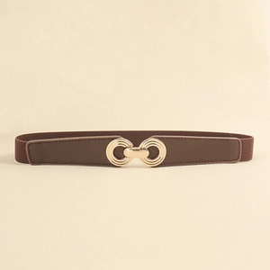 Detail view of brown elastic waist belt featuring a gold interlocking circle metal buckle