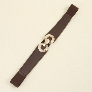Detail of dark brown elastic belt featuring three golden interlocking metal rings buckle