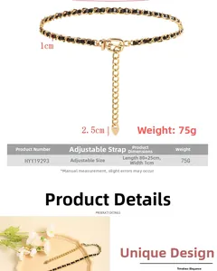 Details der goldfarbenen Metallkette mit Ledergeflecht und Herz-Anhänger