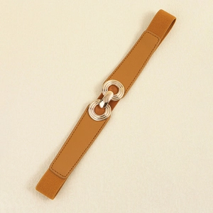 Detailed view of women's elastic waist belt with camel PU leather and gold interlocking rings