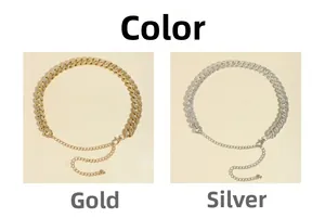 Detail view of rhinestone-encrusted Cuban waist chains in gold and silver finishes