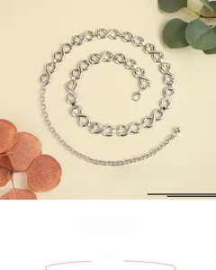 Detail of silver infinity link chain belt with lobster clasp closure and 105cm length