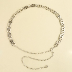 Detailed view of shiny silver chain belt featuring overlapping rings and lobster clasp closure