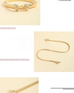 Detailed macro view of the elastic gold metal waist chain with a twin leopard head buckle