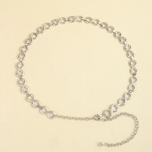 Detail of silver chain belt with infinity links and adjustable lobster clasp closure
