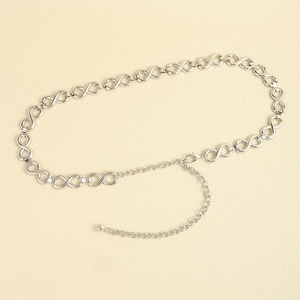 Macro detail of silver infinity chain belt with lobster clasp and adjustable metal links