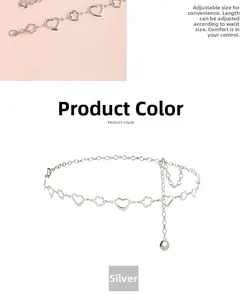 Détail de la ceinture chaîne argentée à motifs de cœur et fleur avec fermoir ajustable